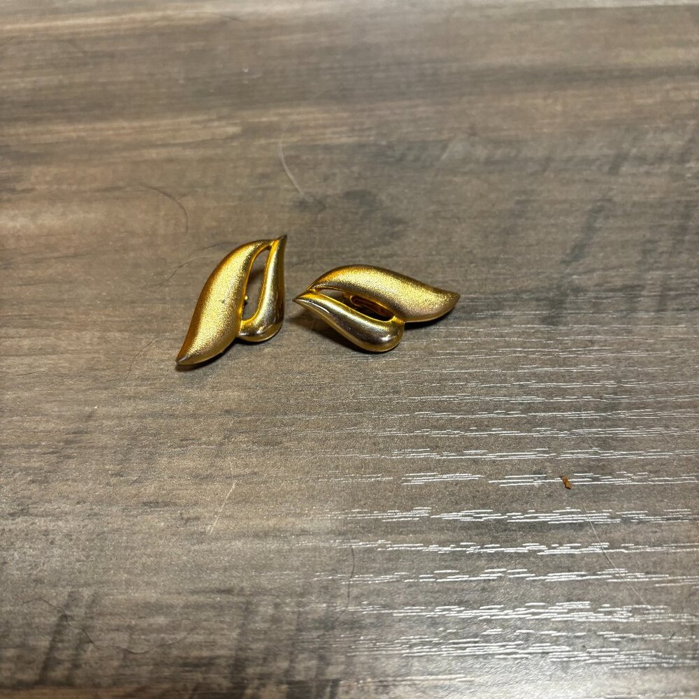 Dante clip earrings brushed shiny gold tone double scrolls